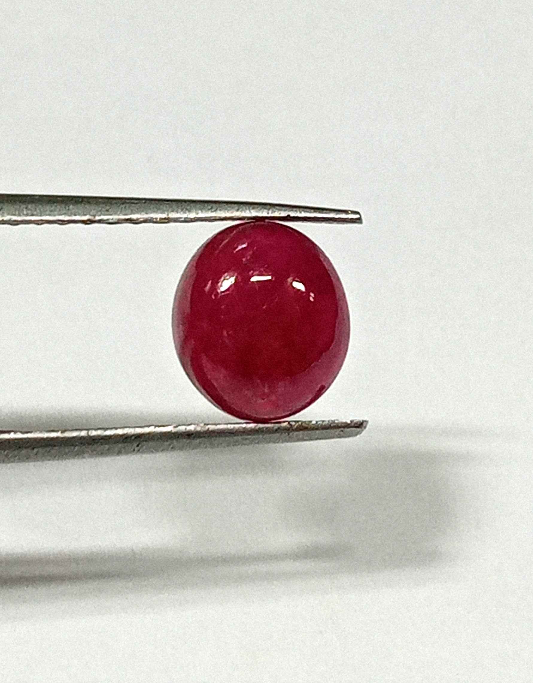2_457aa2aa-5651-49a6-a433-923c394a32df 3.85 Cts Natural Myanmar Red Ruby Gemstone Oval Cabochon 8.8*7.8 MM R423