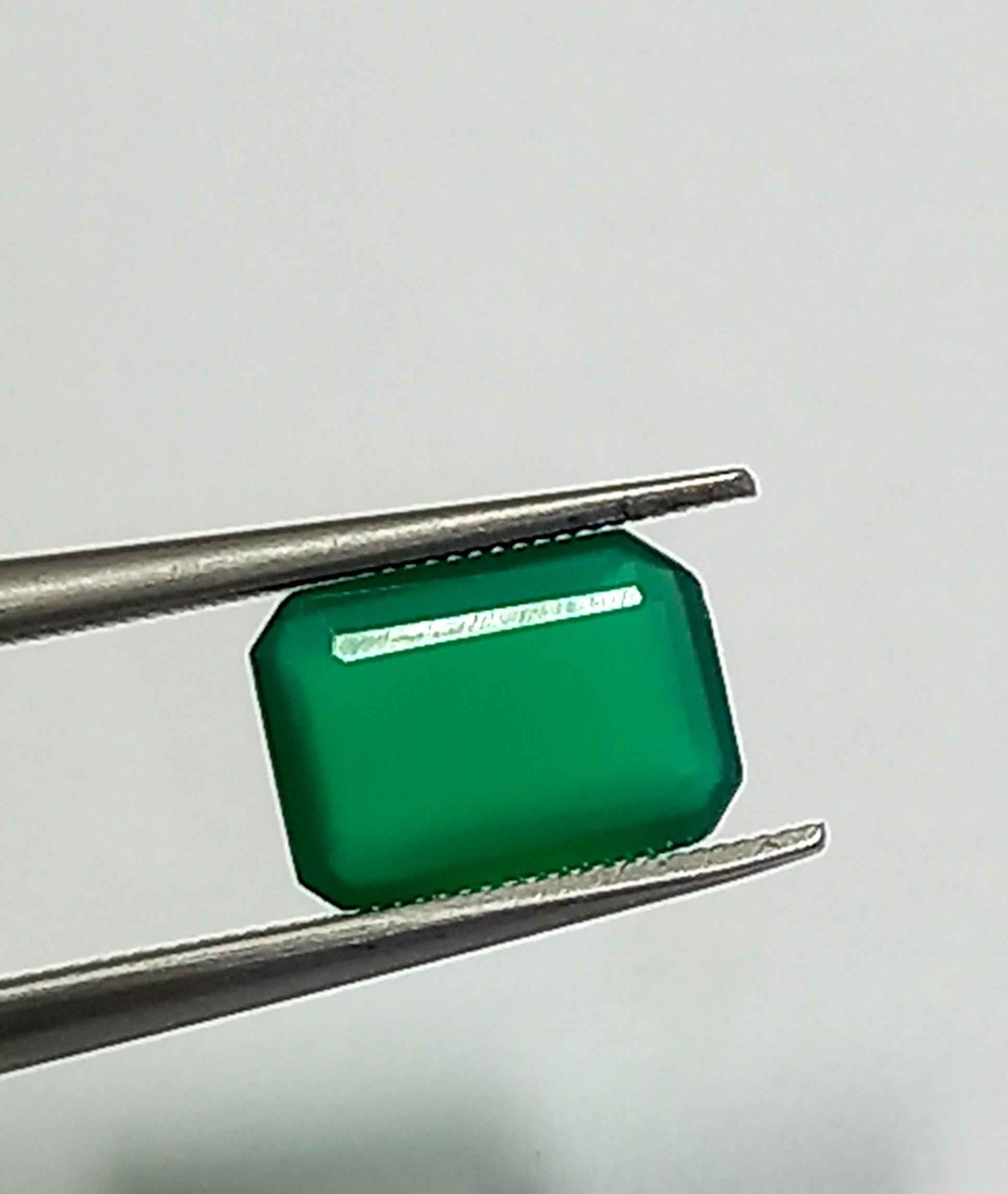 NATURALEMERALDGEMSTONE2_89dd982e-e6c3-4096-8a55-11b67bb38e45 0.75 Cts Natural Zambian Emerald Gemstone Emerald Cut 7.1*5.1 MM EM750