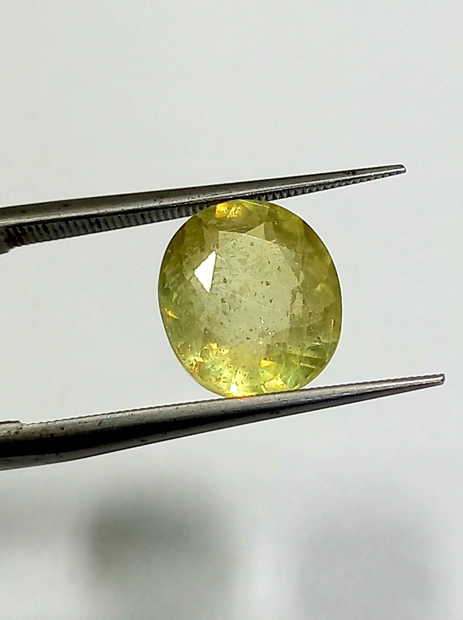 NATURALYELLOWSAPPHIREGEMSTONE2_0169d20b-af4e-4d58-873d-48c2b26a3a6a 4.46 Cts Natural Bangkok Yellow Sapphire Gemstone Oval Cut 9.8*8.8 MM YS596