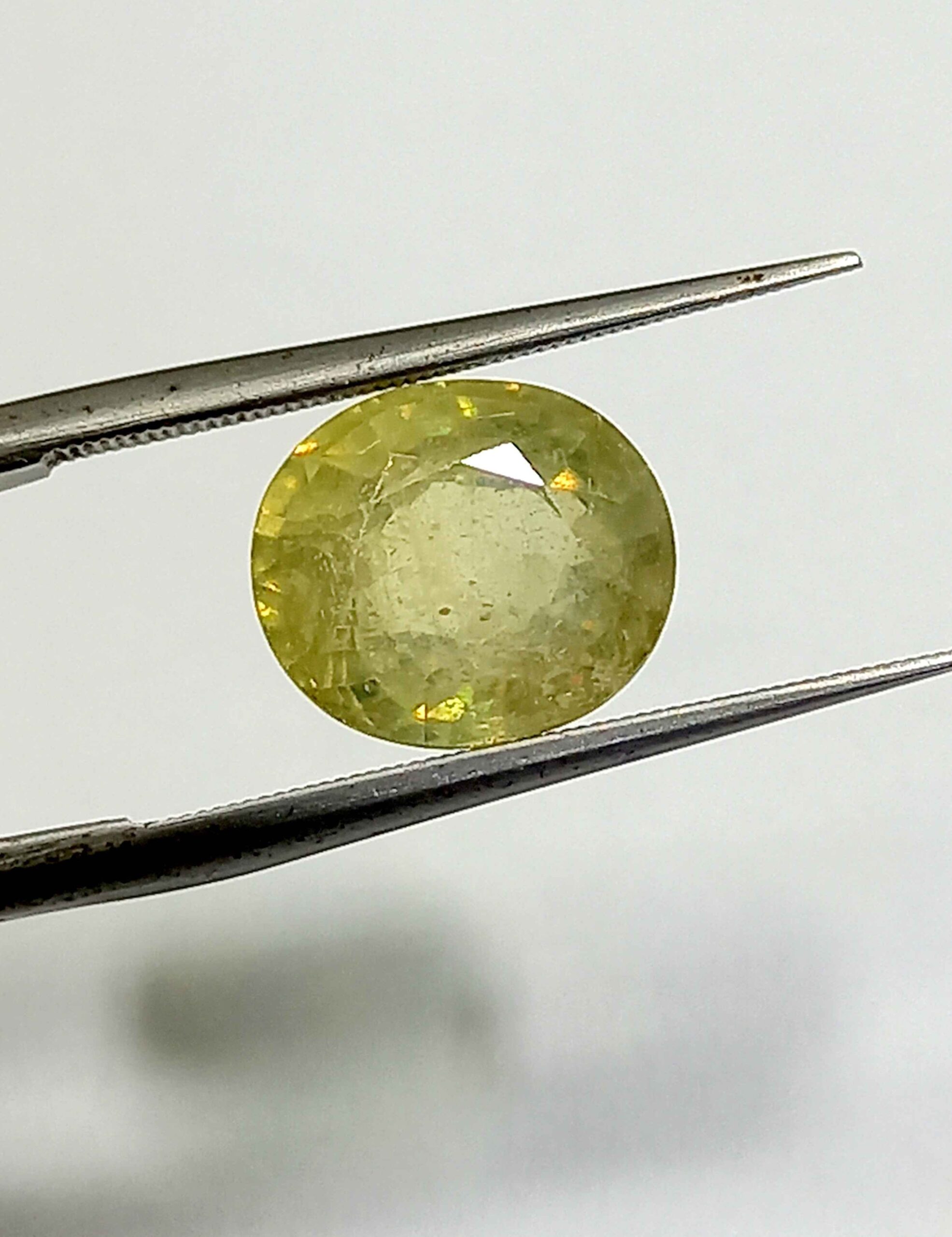 NATURALYELLOWSAPPHIREGEMSTONE7_cbc58ccb-d39f-4c42-8cd5-6802269cca7d 4.46 Cts Natural Bangkok Yellow Sapphire Gemstone Oval Cut 9.8*8.8 MM YS596
